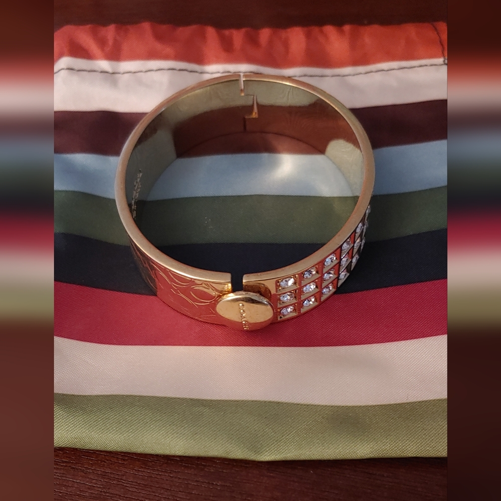 Coach hinged Bracelet with logo and rhinestones